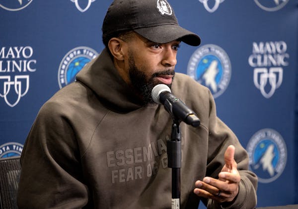 Mike Conley of the Minnesota Timberwolves speaks during an end of season press conference.