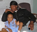 Benjamin Cooper and his father, Sayma Cooper, at North Memorial Medical Center in Robbinsdale, where the 3-year-old was recuperating from injuries suf