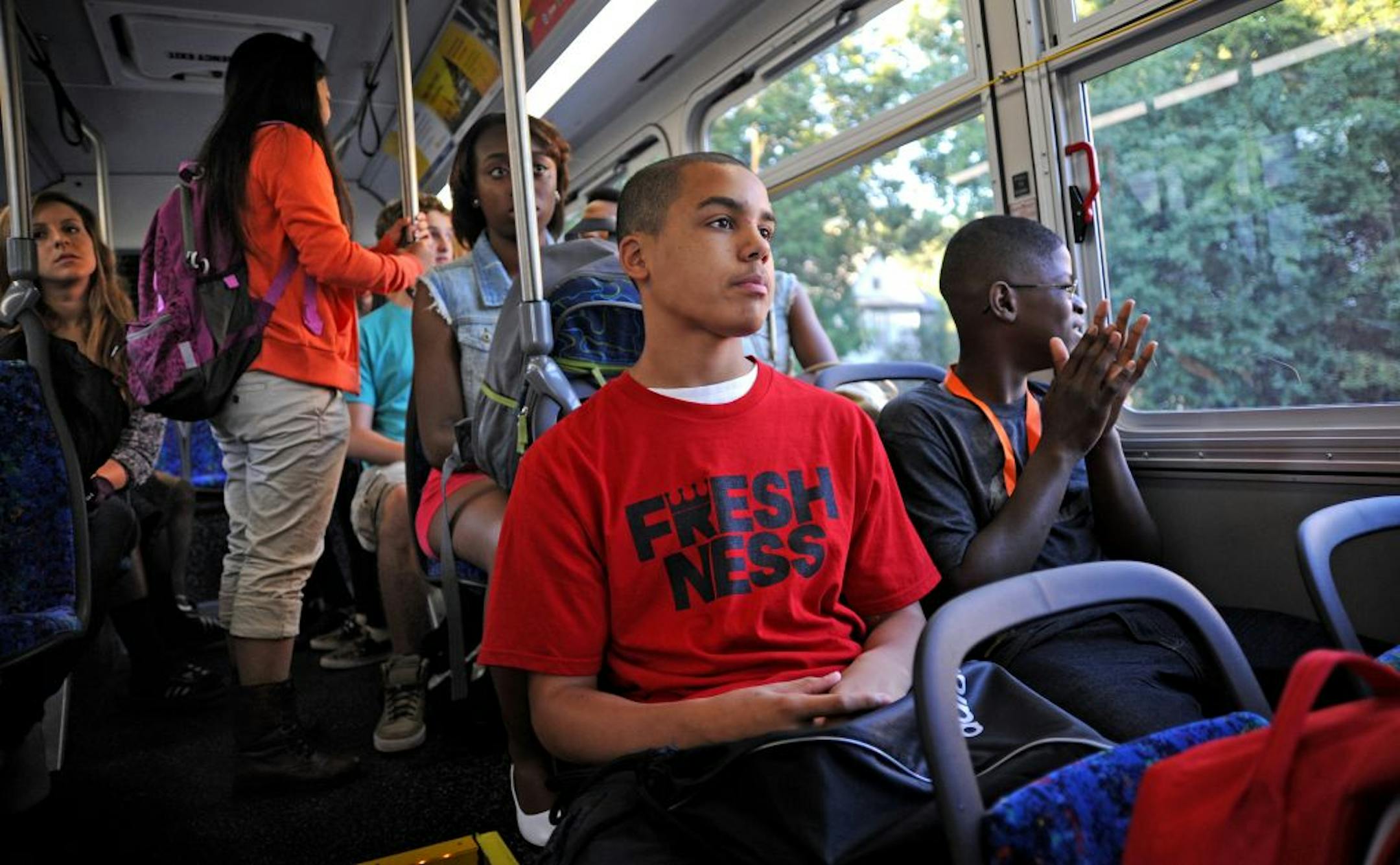 Marquel Emery, left, and William Brown, both 16, sat together on the No. 5 Metro Transit bus on the way to Minneapolis' Patrick Henry High School on Monday.