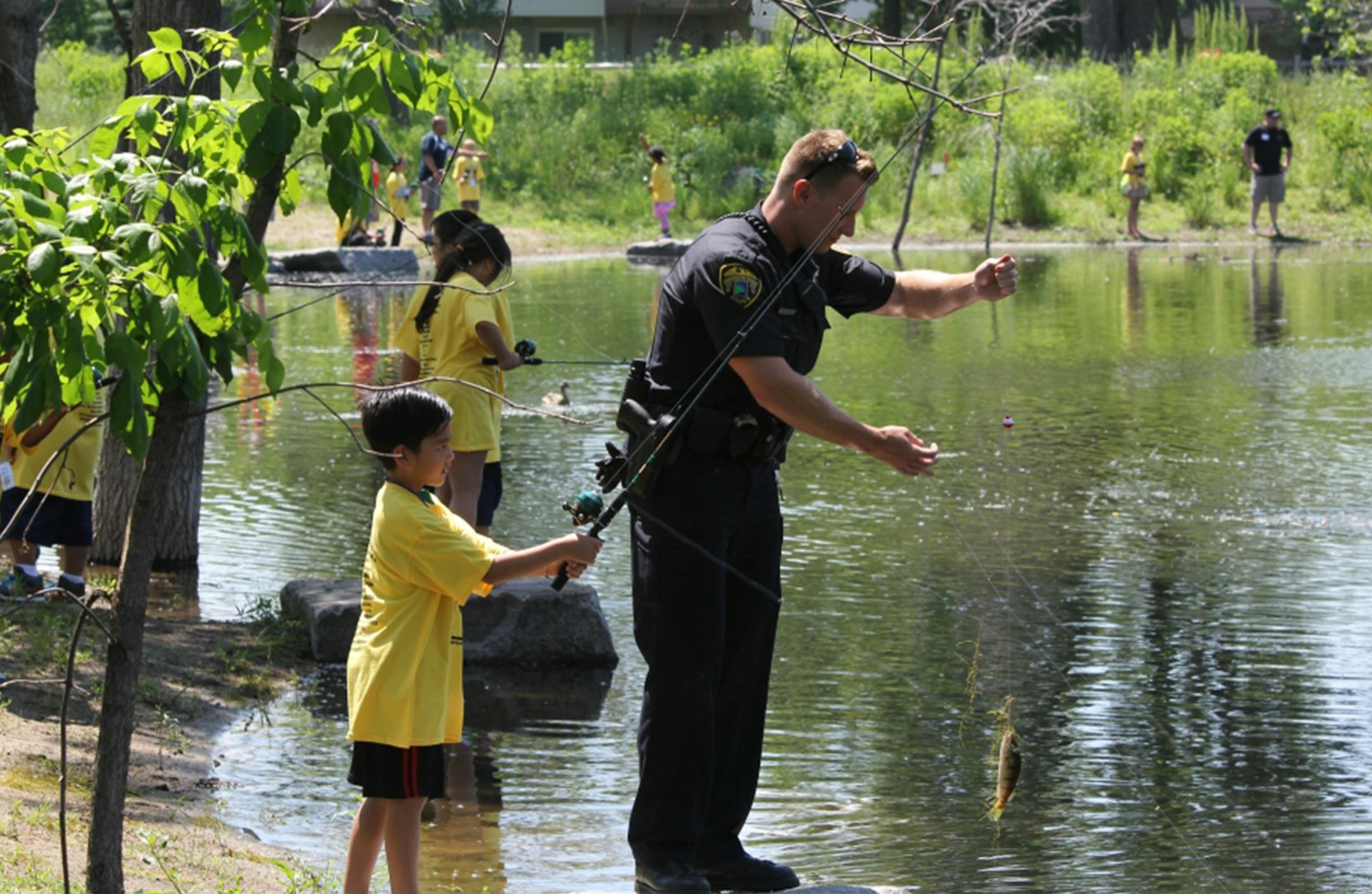 Brooklyn Park police Cops n Kids fishing outing. June 2015