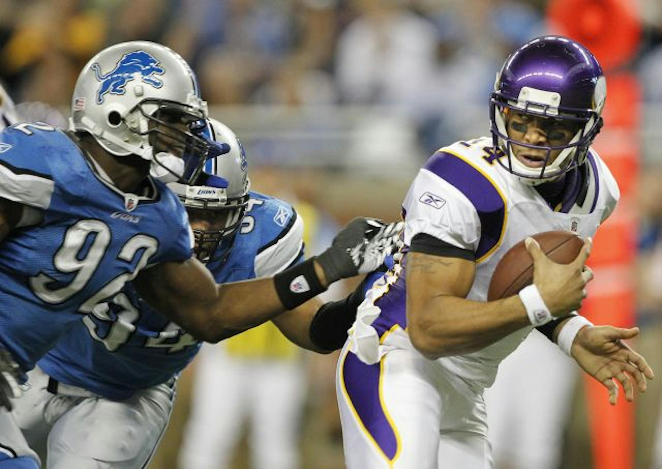 Vikings quarterback Joe Webb (right)