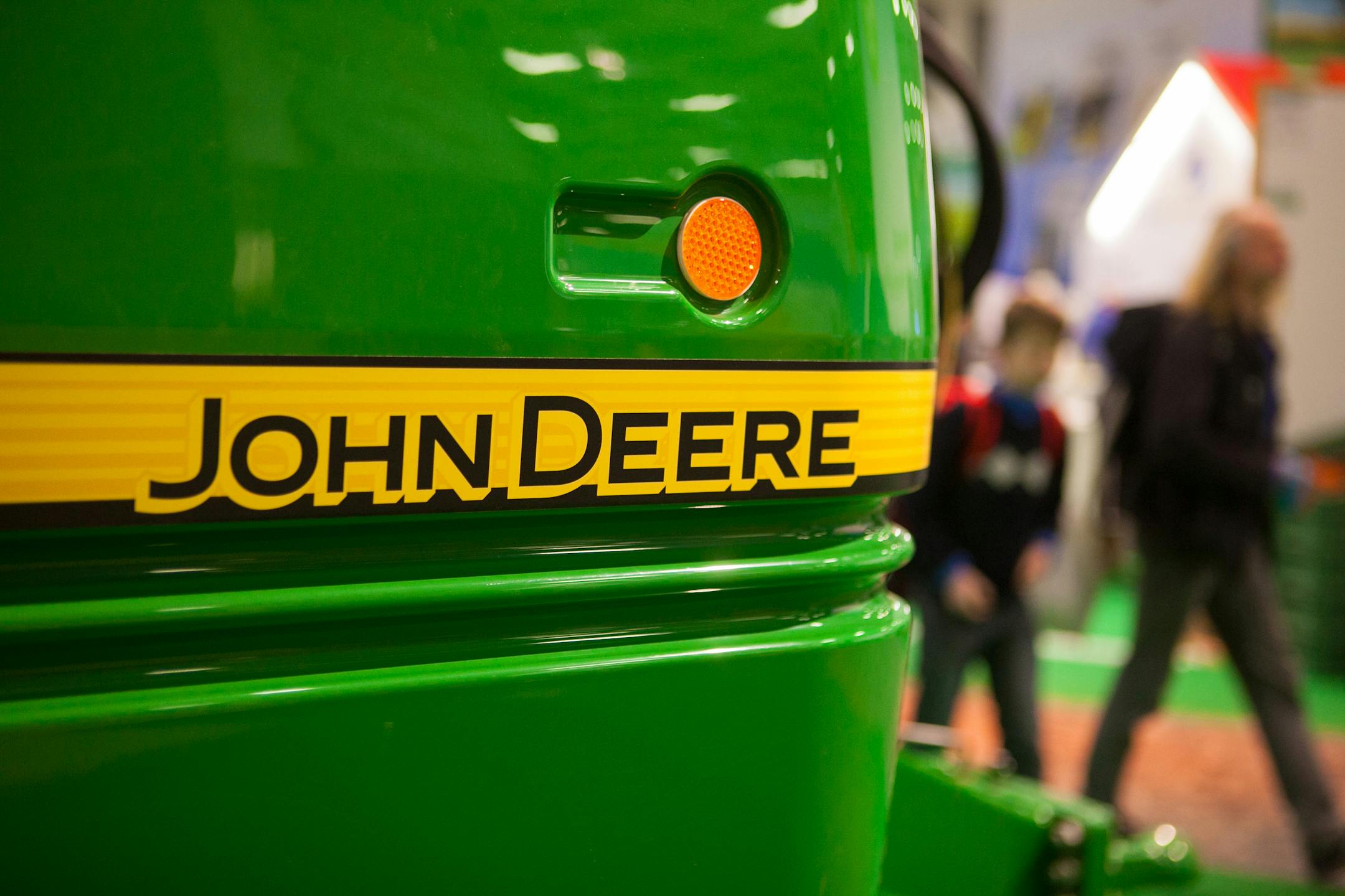 A John Deere R962i trailer crop sprayer, manufactured by Deere & Co., stands on display at the Green Week agricultural trade fair at the Messe Berlin exhibition center in Berlin, Germany, on Sunday, Jan. 26, 2014. German business confidence rose to the highest level in more than two years and beat economists' forecasts in a signal that the expansion in Europe's largest economy may be accelerating. Photographer: Krisztian Bocsi/Bloomberg