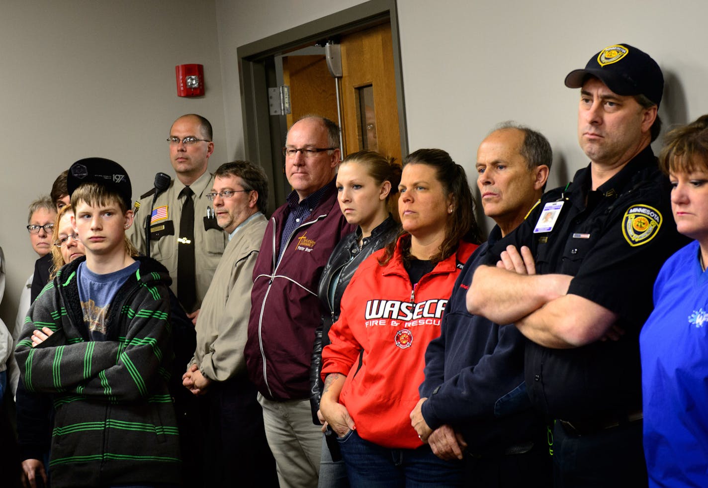 Students, parents and community members stood in the back of the room to listen as Waseca Police Captain Kris Markeson and Waseca school Superintendent Tom Lee spoke at a news conference about the 17-year-old arrested in plot to kill family and massacre students at Waseca school. ] Thursday, May 1, 2014 GLEN STUBBE * gstubbe@startribune.com