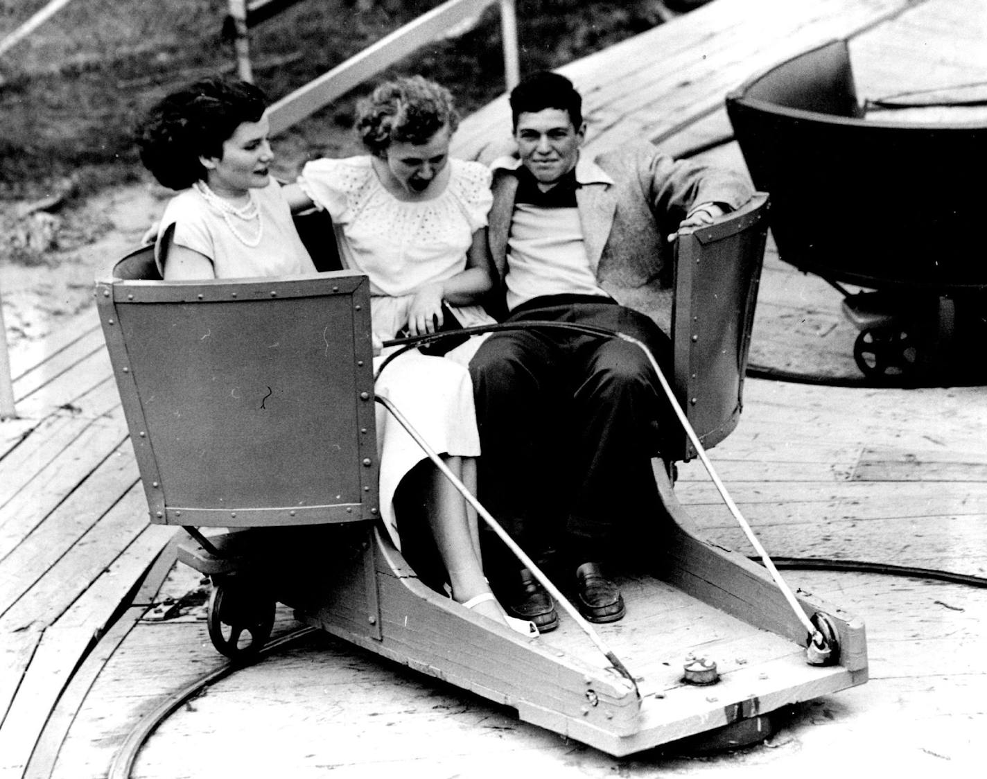 June 11, 1950 Three Eyota, Minn., seniors react differently to the Tilt-a-whirl. They are Susan Overran, Marian Ihrke, and Jerry Lahmers. May 18, 1950 Powell Krueger, Minneapolis Sunday Tribune ORG XMIT: MIN2014121313352454