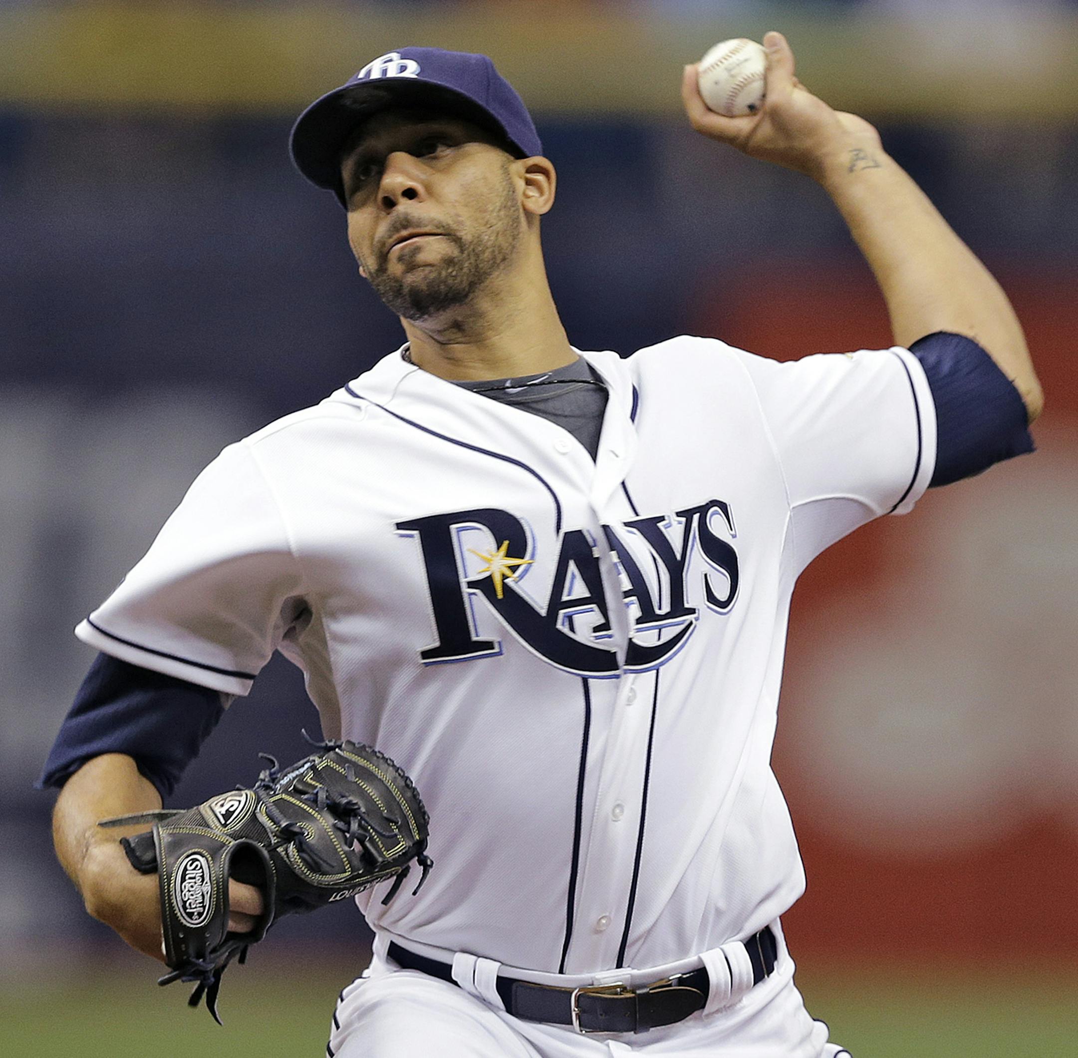 Tampa Bay Rays starting pitcher David Price delivers to the Boston Red Sox during the first inning of a baseball game on Friday, July 25, 2014, in St. Petersburg, Fla. (AP Photo/Chris O'Meara)
