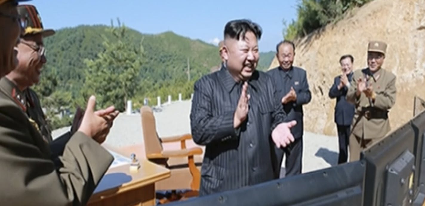 This image made from video of a news bulletin aired by North Korea's KRT on Tuesday, July 4, 2017, shows what was said to be North Korea leader Kim Jung Un, center, applauding after the launch of a Hwasong-14 intercontinental ballistic missile, ICBM, in North Korea's northwest. Independent journalists were not given access to cover the event depicted in this photo. North Korea claimed to have tested its first intercontinental ballistic missile in a launch Tuesday, a potential game-changing devel