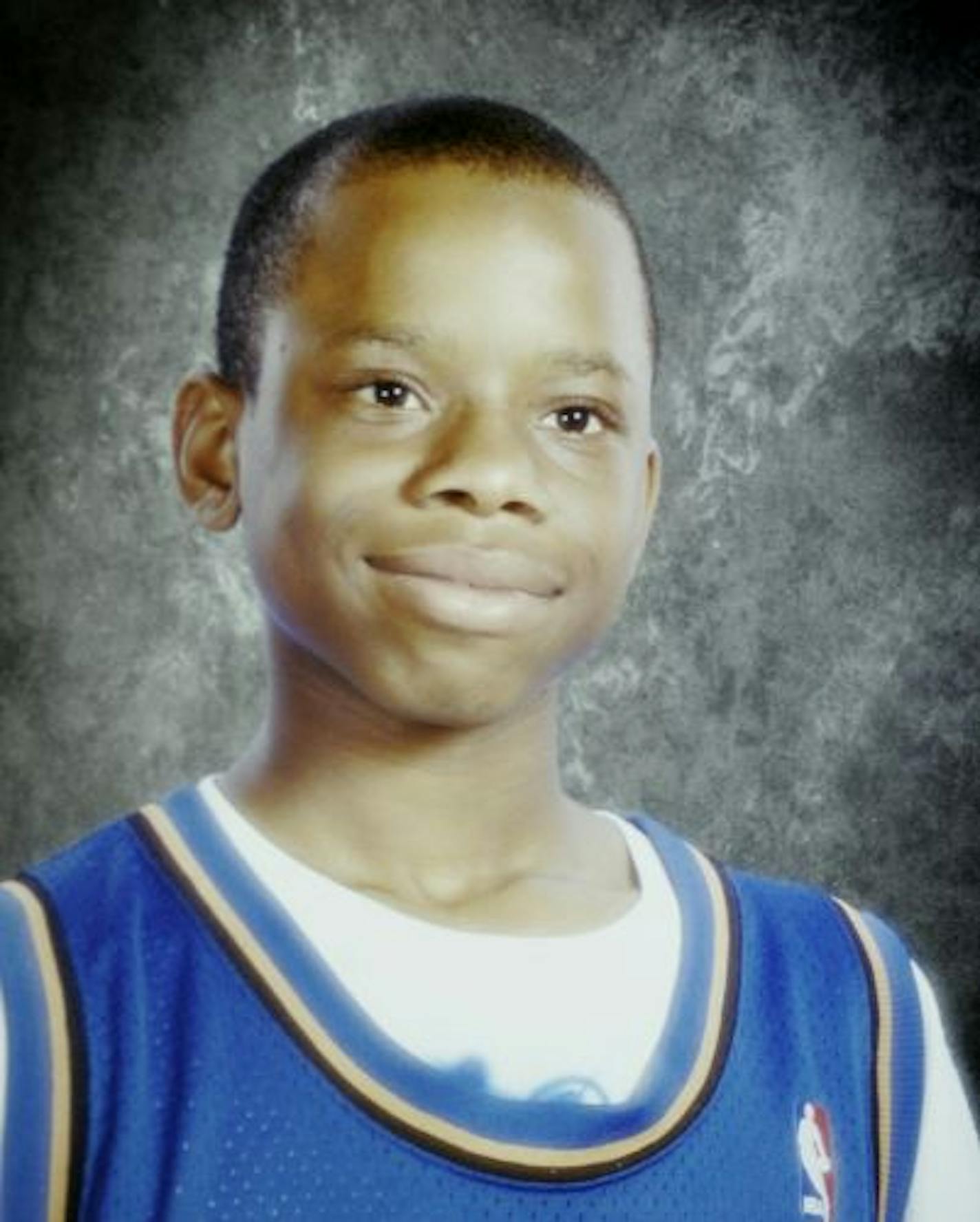 Richard Tsong-Taatarii/Star Tribune -- Minneapolis,MN;12/15/04;left to right:A high school picture of Courtney Williams was fatally shot by Minneapolis Police Officer Scott Mars. GENERAL INFORMATION: Brewer is the mother of 15-year-old Courtney Williams, who was fatally shot by Minneapolis Police Officer Scott Mars.