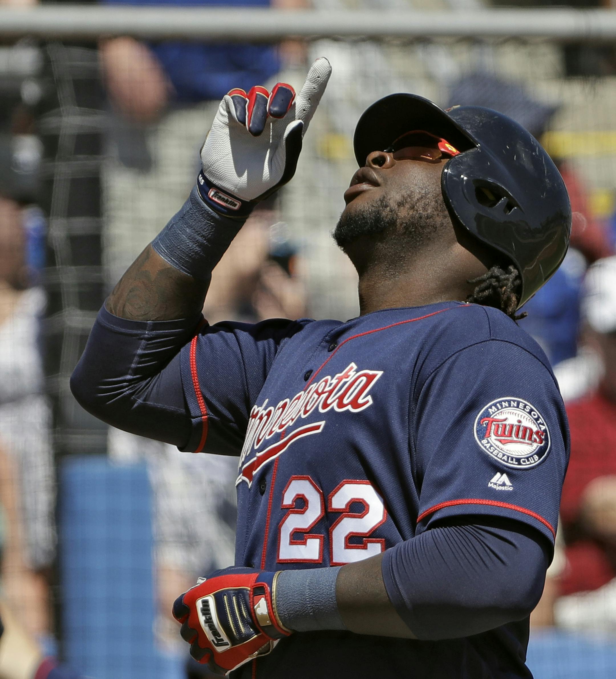 Minnesota Twins' Miguel Sano gestures after crossing home plate following his home run off Toronto Blue Jays relief pitcher J.P. Howell during the sixth inning of a spring training baseball game Monday, March 20, 2017, in Dunedin, Fla. (AP Photo/Chris O'Meara)