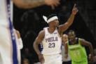Philadelphia 76ers guard Jimmy Butler (23) gestured after scoring a basket in the first quarter Saturday night against the Timberwolves.