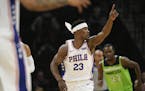 Philadelphia 76ers guard Jimmy Butler (23) gestured after scoring a basket in the first quarter Saturday night against the Timberwolves.