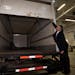 Police officers open the back of a recovered truck during a press conference regarding Project 24K a joint investigation into the theft of gold from P