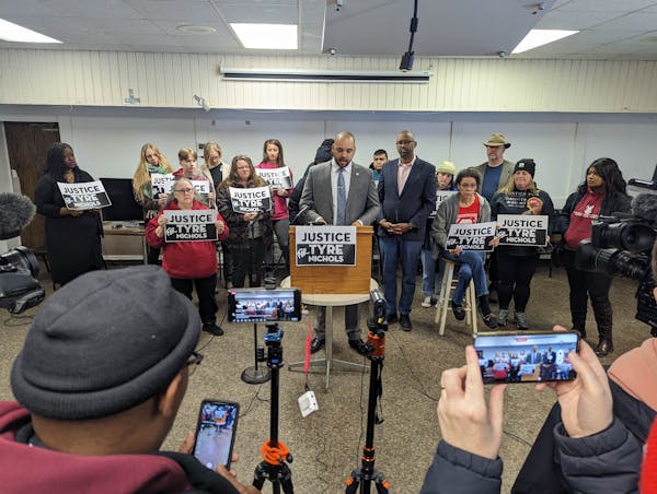 Nekima Levy Armstrong, Johnathon McClellan and others gathered Saturday, Jan. 28, to demand action on police reform.