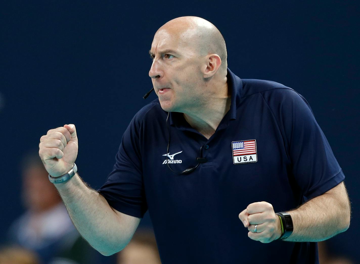 USA coach Hugh McCutcheon attempts to fire up his team against Brazil during a women's volleyball gold medal match at the 2012 Summer Olympics Saturday, Aug. 11, 2012, in London. (AP Photo/Chris O'Meara)