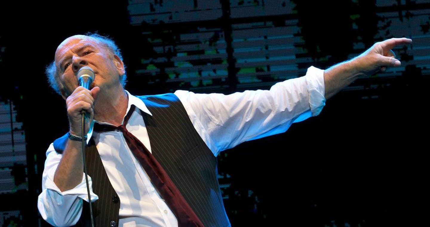 Grammy Award-winning American singer Art Garfunkel performs on stage at the Bloomfield Stadium in the Israeli city of Tel Aviv, on June 10, 2015. AFP PHOTO / GIL COHEN-MAGEN