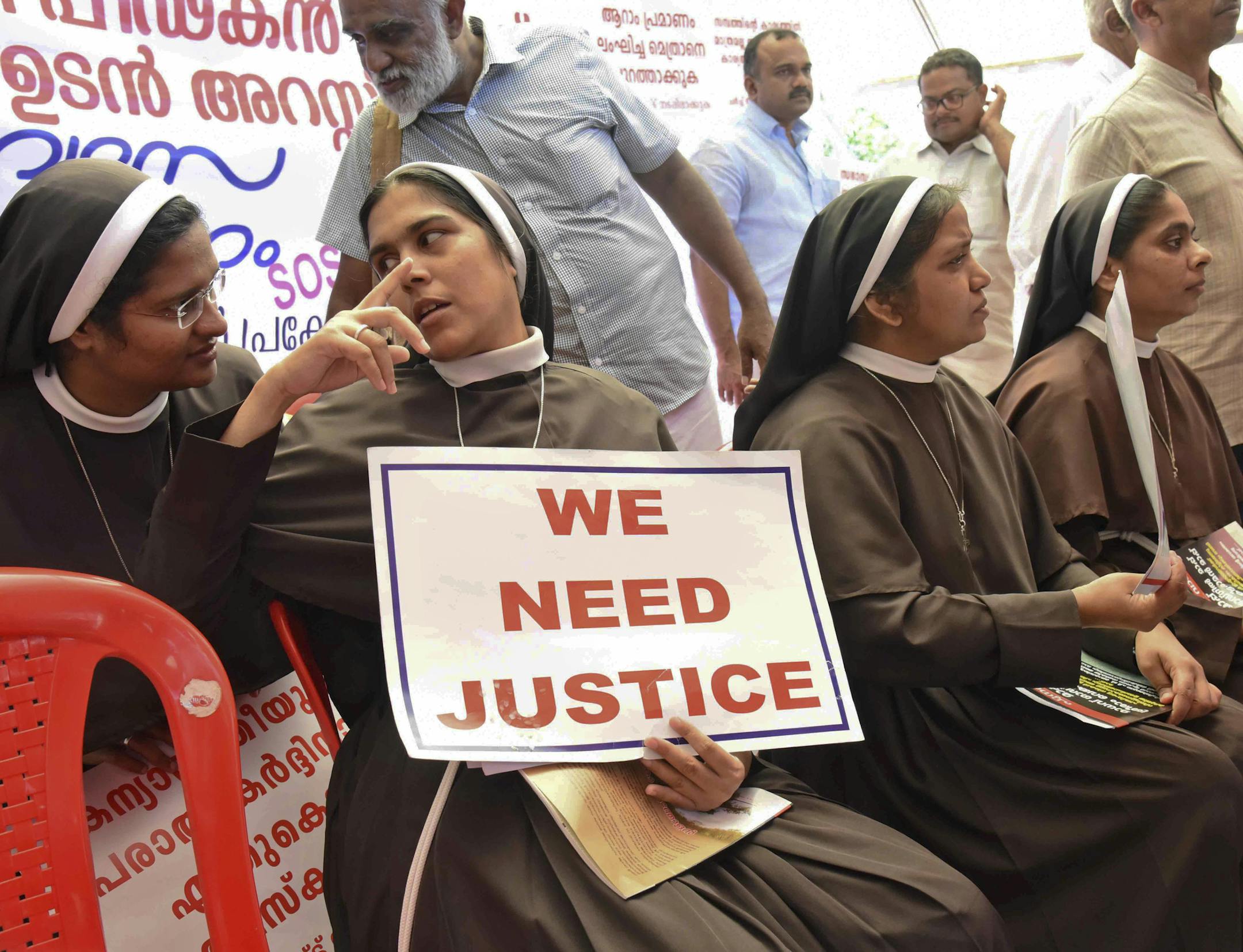 Catholic nuns hold placards demanding the arrest of a bishop who one nun has accused of rape, during a public protest in Kochi, Kerala, India, Wednesday, Sept. 12, 2018. The protest that began last week follows a June complaint to police by a Missionary of Jesus nun who accused Franco Mulakkal, now the bishop of the city of Jalandhar, of repeatedly sexually abusing her from 2014-2016. The bishop has denied the accusations. (AP Photo) ORG XMIT: CHN102