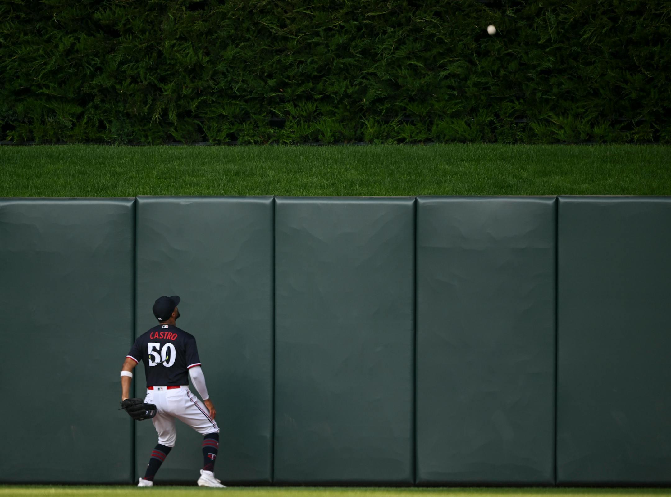 Boston Red Sox center fielder Adam Duvall (18) hits a home run over the head of Minnesota Twins center fielder Willi Castro (50) in the top of the fourth inning Tuesday, June 20, 2023, at Target Field in Minneapolis, Minn.