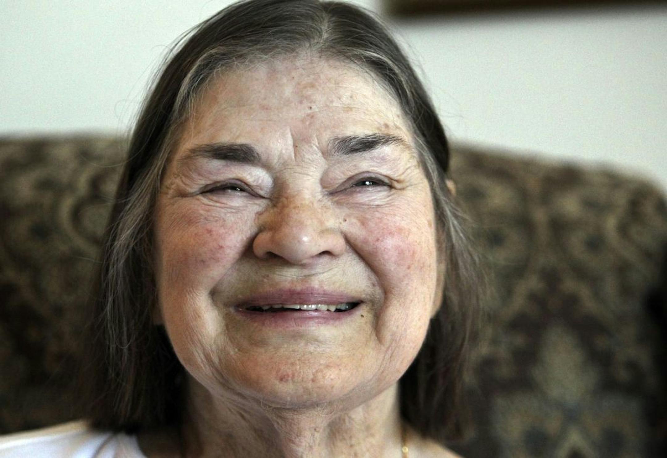 Alphie Cain, 89, talked about how she was surprised with a portrait painted by famed artist Gino Hollander for a birthday present. Her daughter Eileen tracked down the artist and agreed to quit smoking and use the savings from that to buy the painting for $2,000 - a deep discount from his original asking price of $10,000. Cain is the mother of 17 children. "They didn't all come at once," she said.