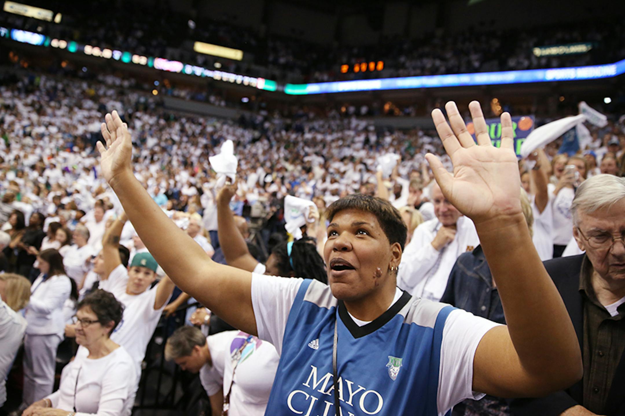 Terry McFarland of St. Paul celebrates the Minnesota Lynx winning the WNBA title.