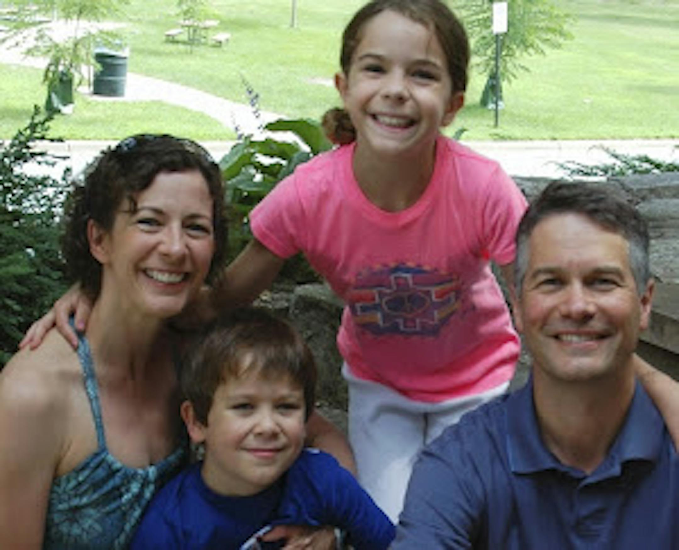 Lauri and Larry Kraft with their children Jamie and Jason.
