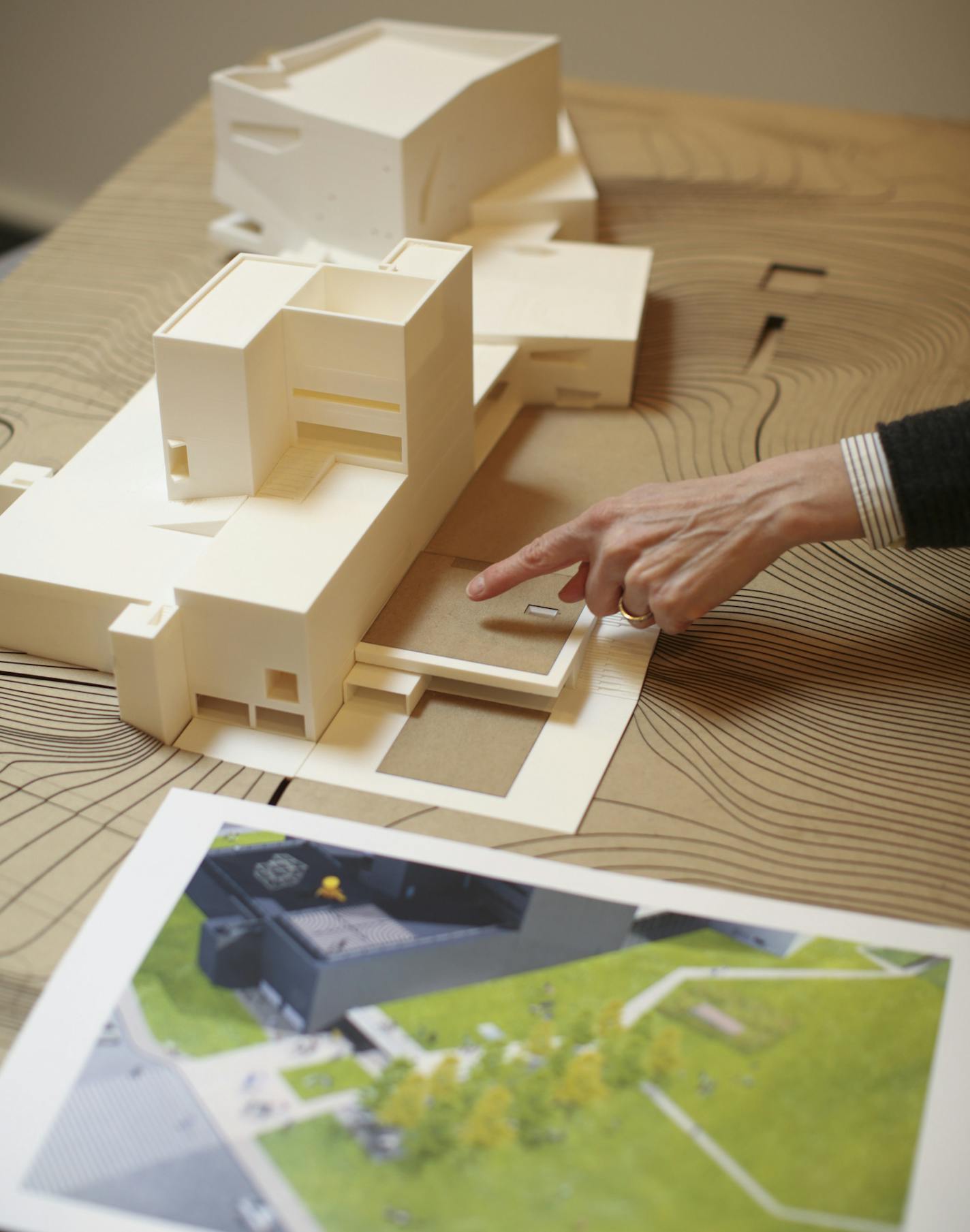 Architect Joan Soranno of HGA pointed out a feature of the renovation on a model of the Walker Art Center during a preview in director Olga Viso's office Tuesday afternoon. ] JEFF WHEELER &#x2022; jeff.wheeler@startribune.com Coinciding nicely with the museum's 75th anniversary, director Olga Viso of the Walker Art Center gave a sneak preview Tuesday, March 24, 2015 of extensive renovations made possible by a $75 million capital campaign.