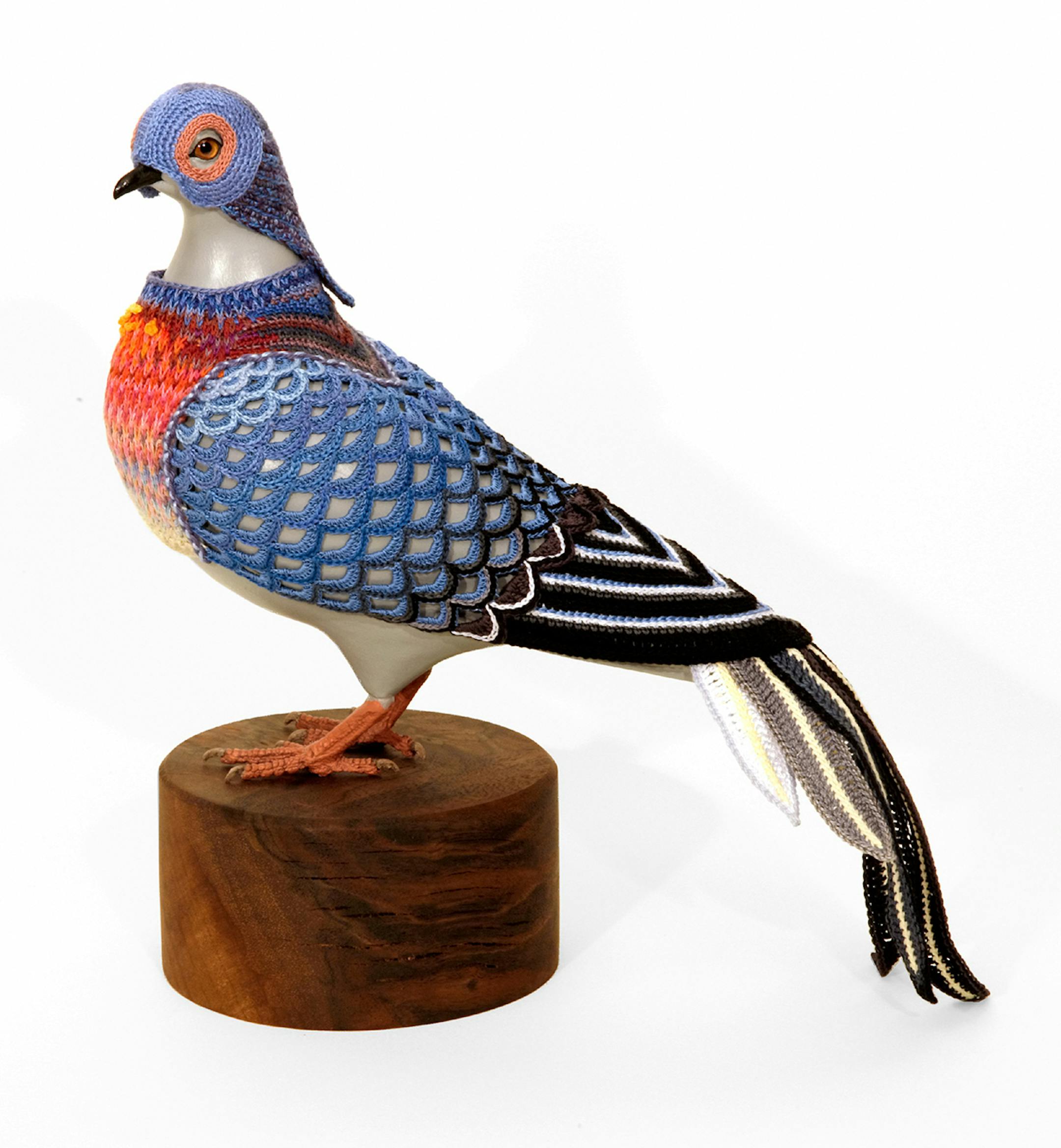Laurel Roth Hope Biodiversity Suits for Urban Pigeons: Passenger Pigeon II, 2014 Yarn, polyurethane, pewter, glass, epoxy, and walnut stand 12 in. ◊ 5 1/2 in. ◊ 12 in . Courtesy Crystal Bridges Museum of American Art, Bentonville, Arkansas. Photo: Andy Hope