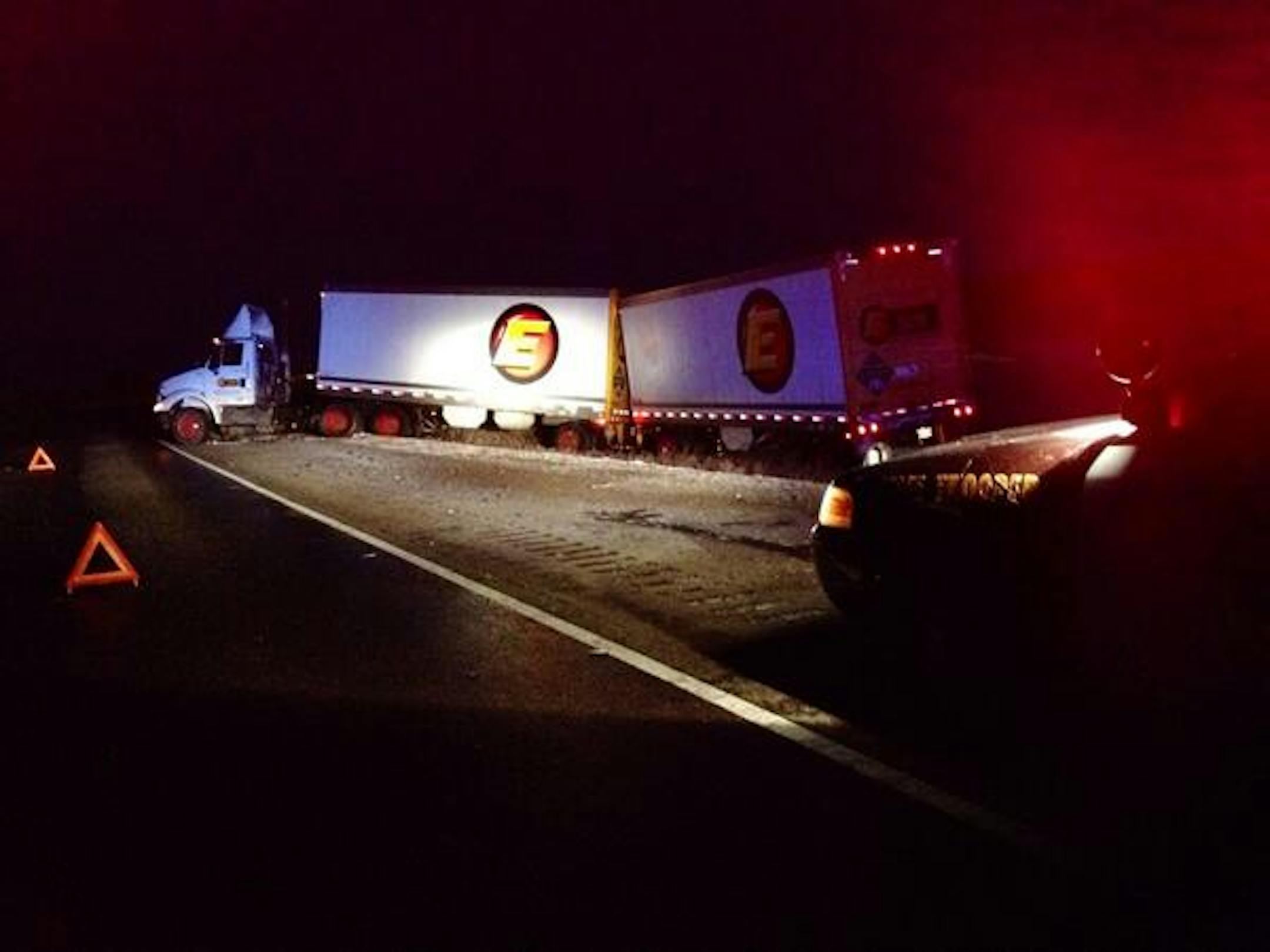 A semitrailer truck with two trailers jackknifed on eastbound I-94 near Rothsay, Minn., early Wednesday amid snowy and icy conditions.