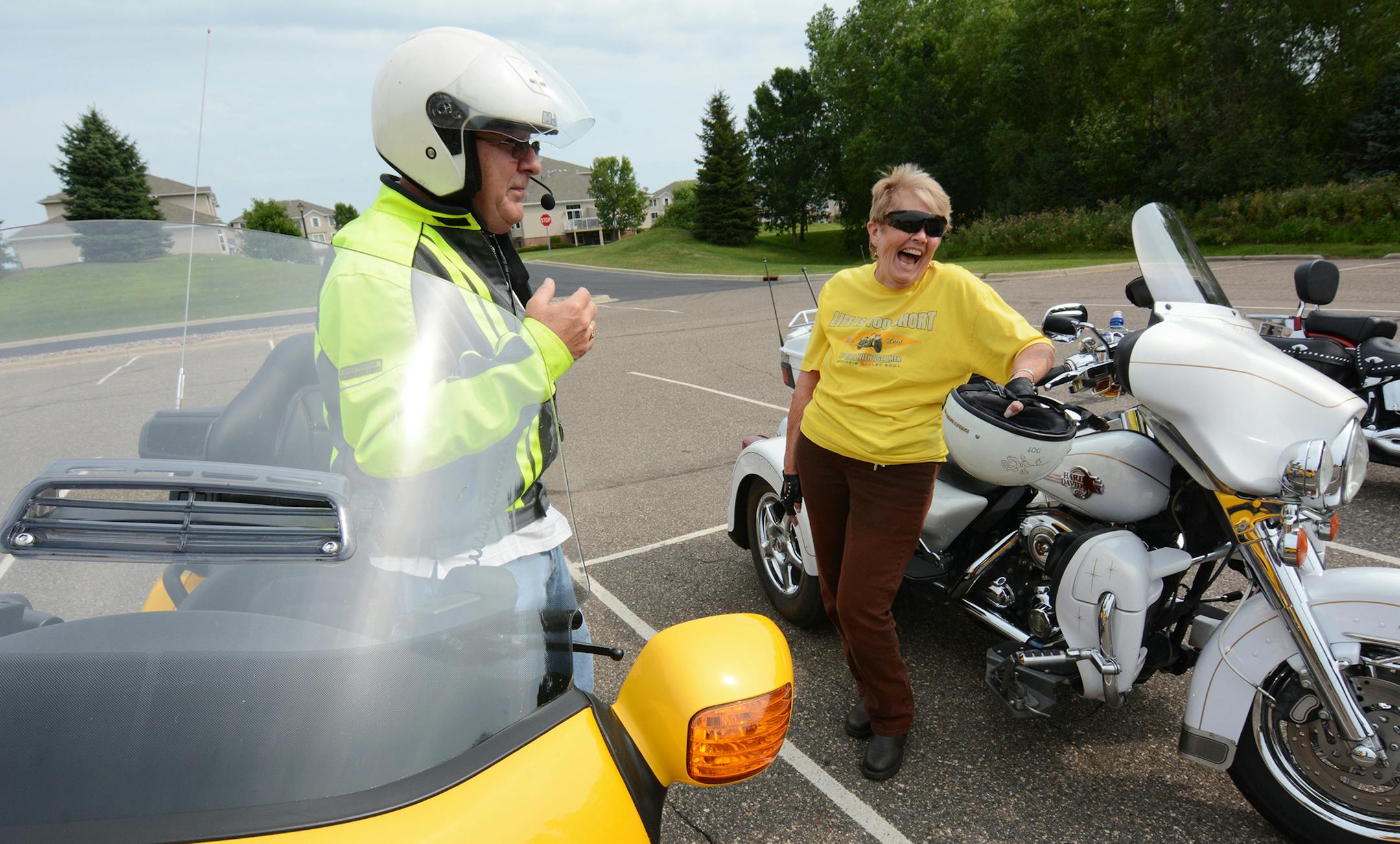 (left to right) Richard Thienes and Flo Cranor, both of Lakeville, prepared to head out on a Thursday morning ride from the Lakeville Heritage Center. Photo by Liz Rolfsmeier, Special to the Star Tribune