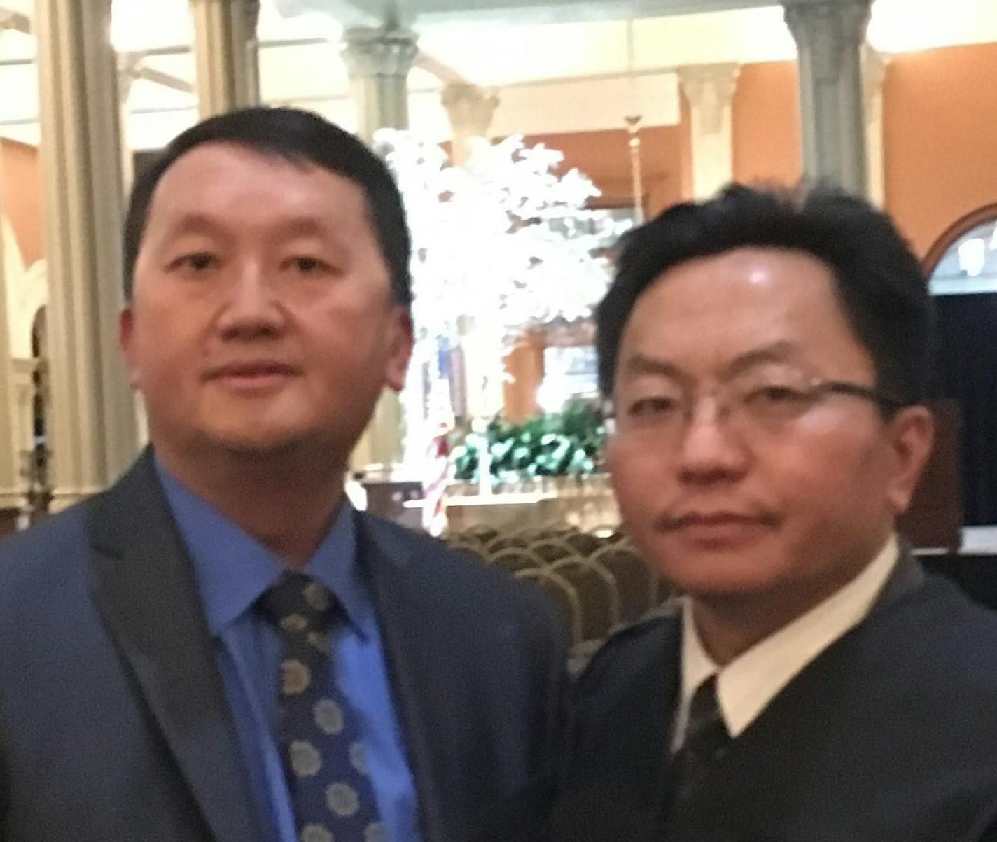 Newly elected Ramsey County District Court judges Adam Yang, left, and Pao Paul Yang, right. The judges were elected in November and sworn-in earlier this month. They are pictured at Judge P. Paul Yang's investiture ceremony last week.