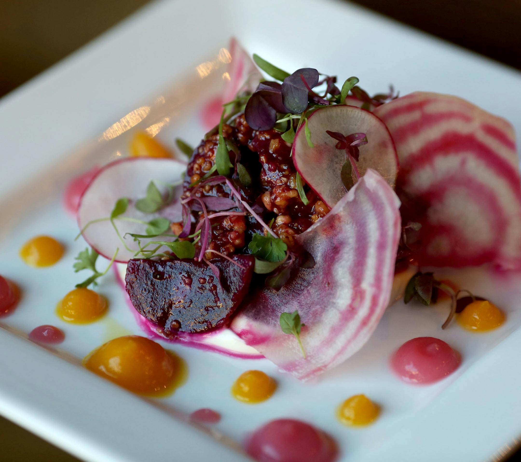 Among the dishes to try at Public Kitchen + Bar: beet salad, seafood cioppino and a half rotisserie chicken.