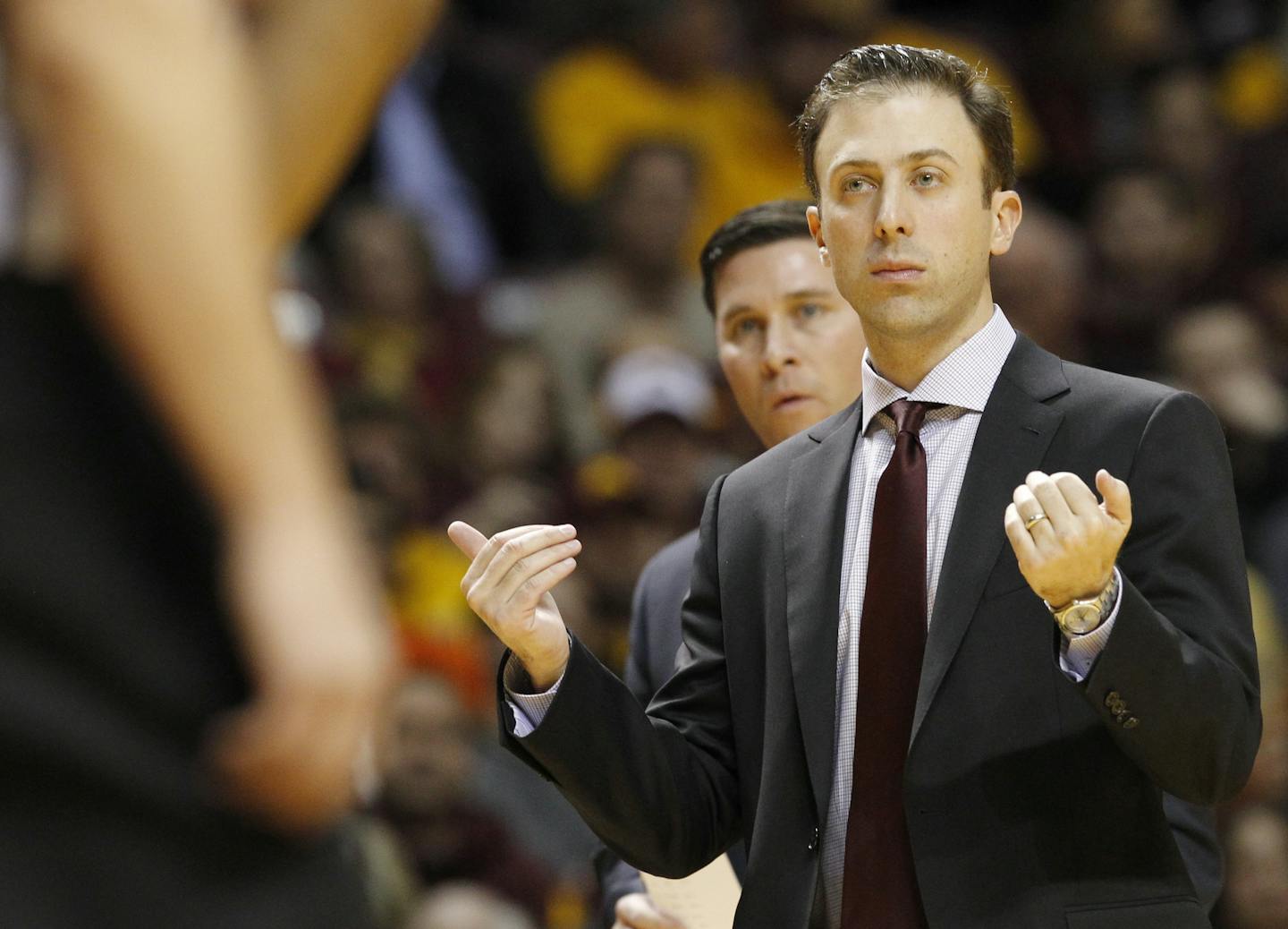 Minnesota head coach Richard Pitino gestures to his players during the first half of an NCAA college basketball game against Illinois in Minneapolis, Saturday, Jan. 24, 2015. (AP Photo/Ann Heisenfelt)