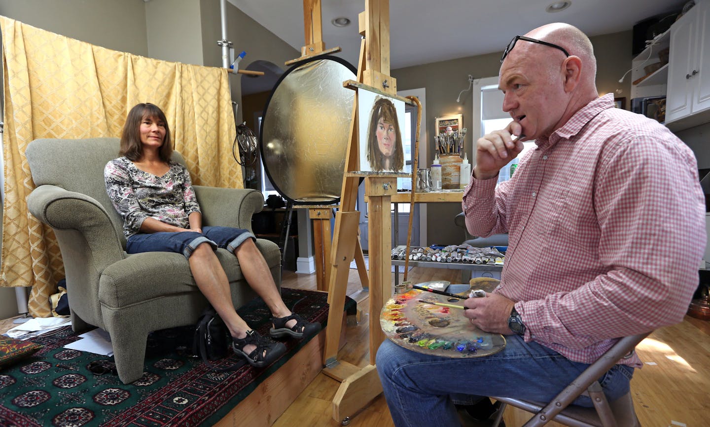 (left to right) Pam Gleason had her portrait painted by Joe Burns on 9/4/13. Burns is spending three hours chatting with almost every person who lives on his block, 5100 Upson Ave South, in Minneapolis, while painting their portrait. In an especially artistic take on community-building, there then will be a show of the neighborhood paintings on Saturday, 9/14/13 through 10/5/13 at Vinaigrette.] Bruce Bisping/Star Tribune bbisping@startribune.com Pam Gleason, Joe Burns/source.