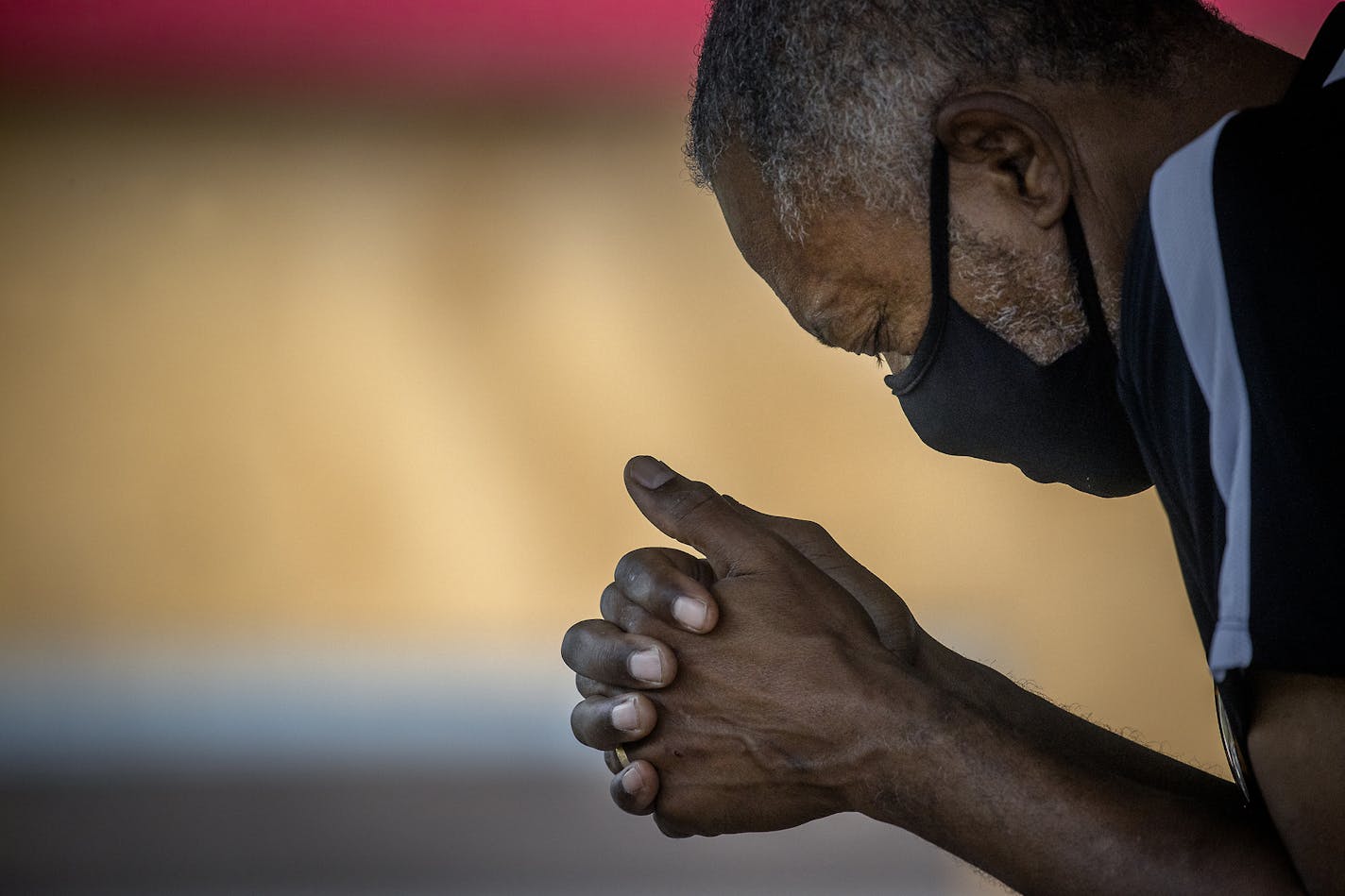 Former Minneapolis City Council Member Don Samuels, prayed for 8 minutes and 45 seconds during a quiet time of prayer at the 30 Days of Prayer: Healing the Heart of Our City, in a parking lot, Tuesday, July 7, 2020 in Minneapolis, MN. ] ELIZABETH FLORES • liz.flores@startribune.com