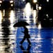 Rain fell on a pedestrian crossing S. 6th Street Tuesday Sept. 6, 2016, in downtown Minneapolis, MN