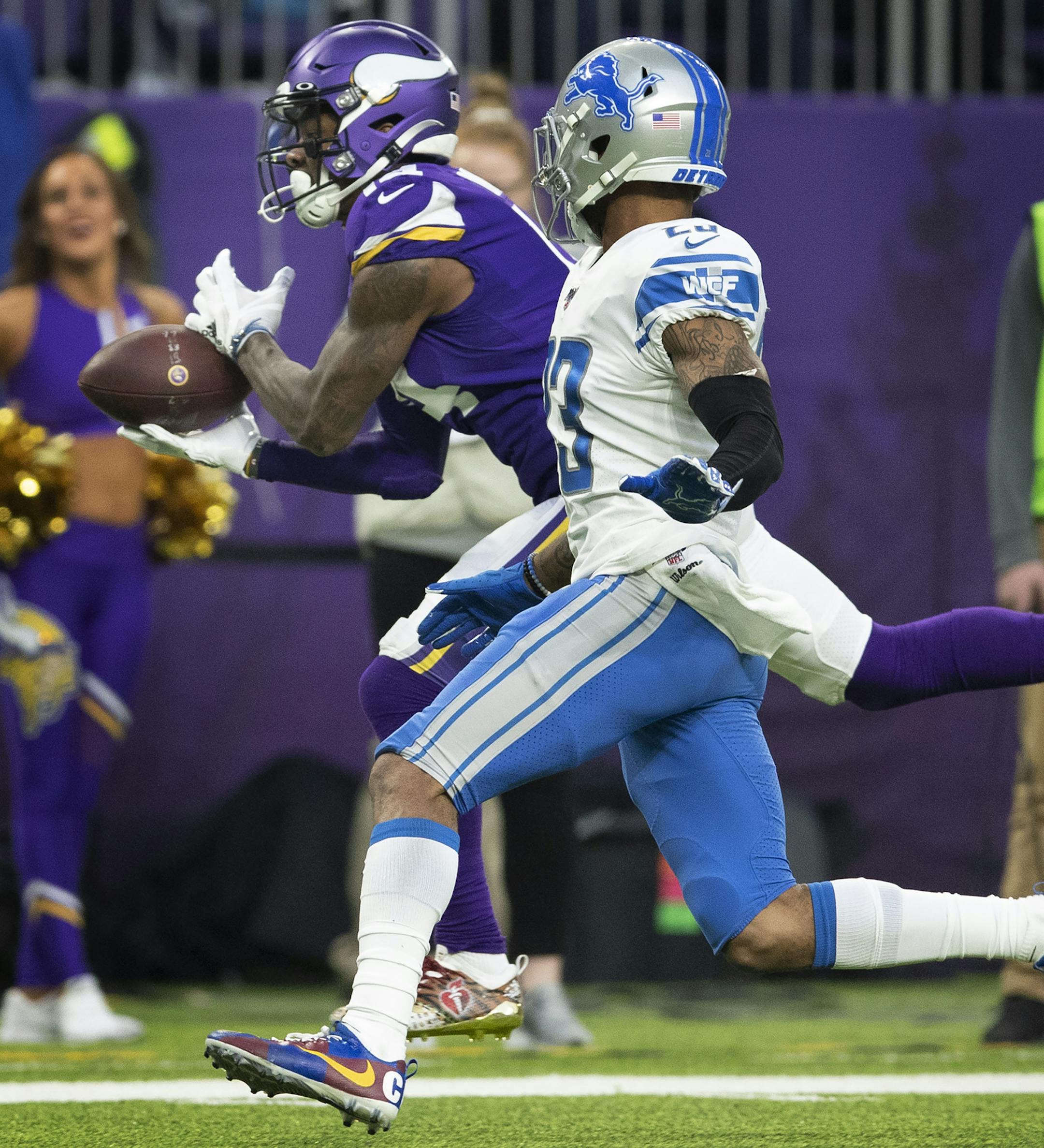 Minnesota Vikings wide receiver Stefon Diggs (14) caught a deep pass over Detroit Lions cornerback Darius Slay (23) in the second quarter. ] Jerry Holt &#x2022; Jerry.Holt@startribune.com The Minnesota Vikings played the Detroit Lions in an NFL football game Sunday , December 08 2019 at U.S. Bank Stadium in Minneapolis, MN.