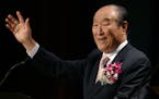 ** FILE ** In this June 25, 2005 file photo, Unification Church leader Rev. Sun Myung Moon speaks during his "Now is God's Time" rally in New York. Mo