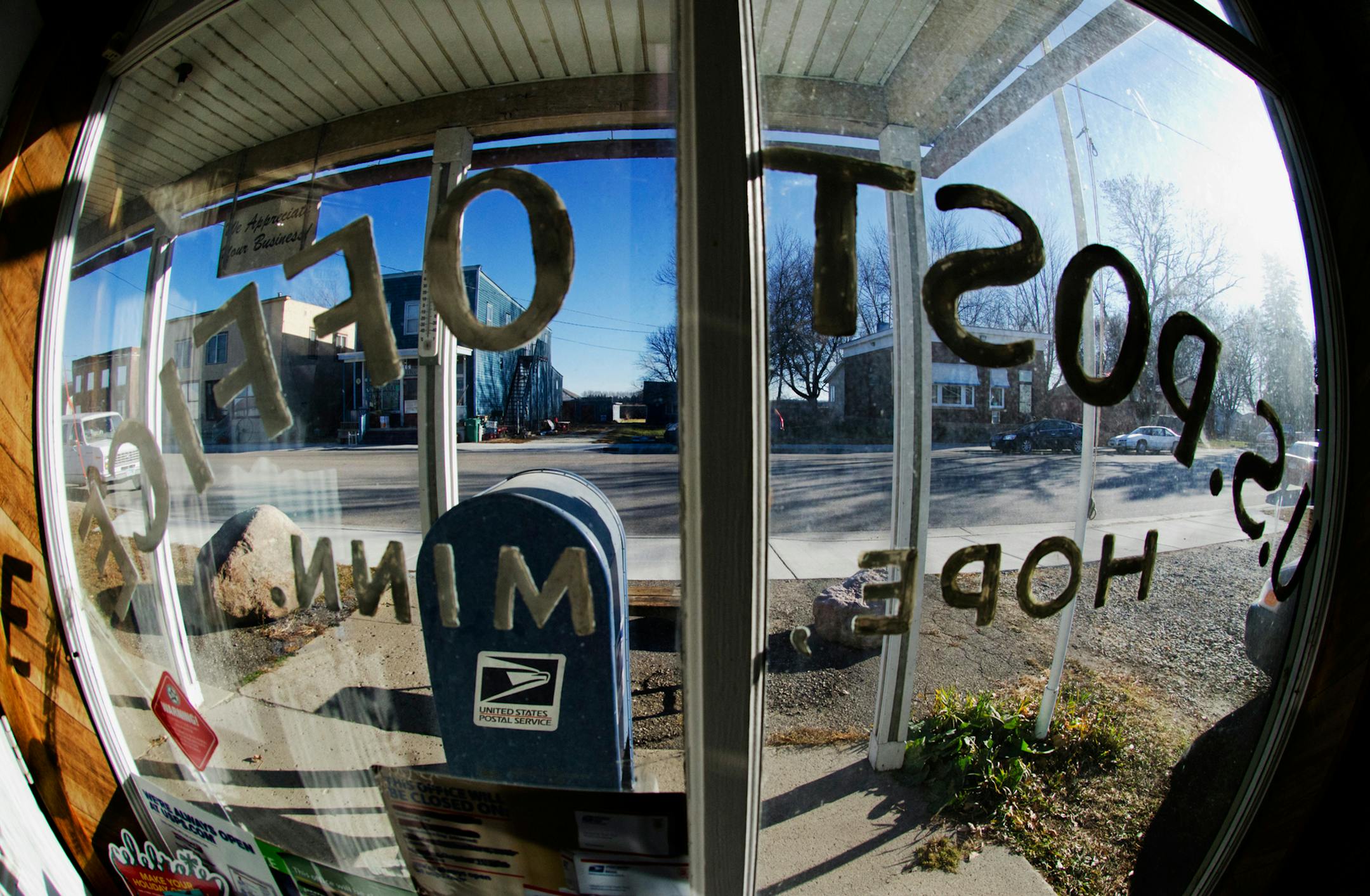 The U.S. Postal Service is seeking to balance it's budget by closing 3,700 small town post offices across the country. The post office in Hope is one of the 100 or so in Minnesota that are being considered for closing. Steele County Highway 4 passes outside the front window of the Hope Minnesota Post Office. ] (DAVID BREWSTER/STAR TRIBUNE ‚Ä¢ dbrewster@startribune.com) **