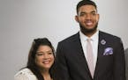 Karl-Anthony Towns poses for a portrait with his family by Timberwolves team Photographer David Sherman before the announcement of his NBA Rookie of t