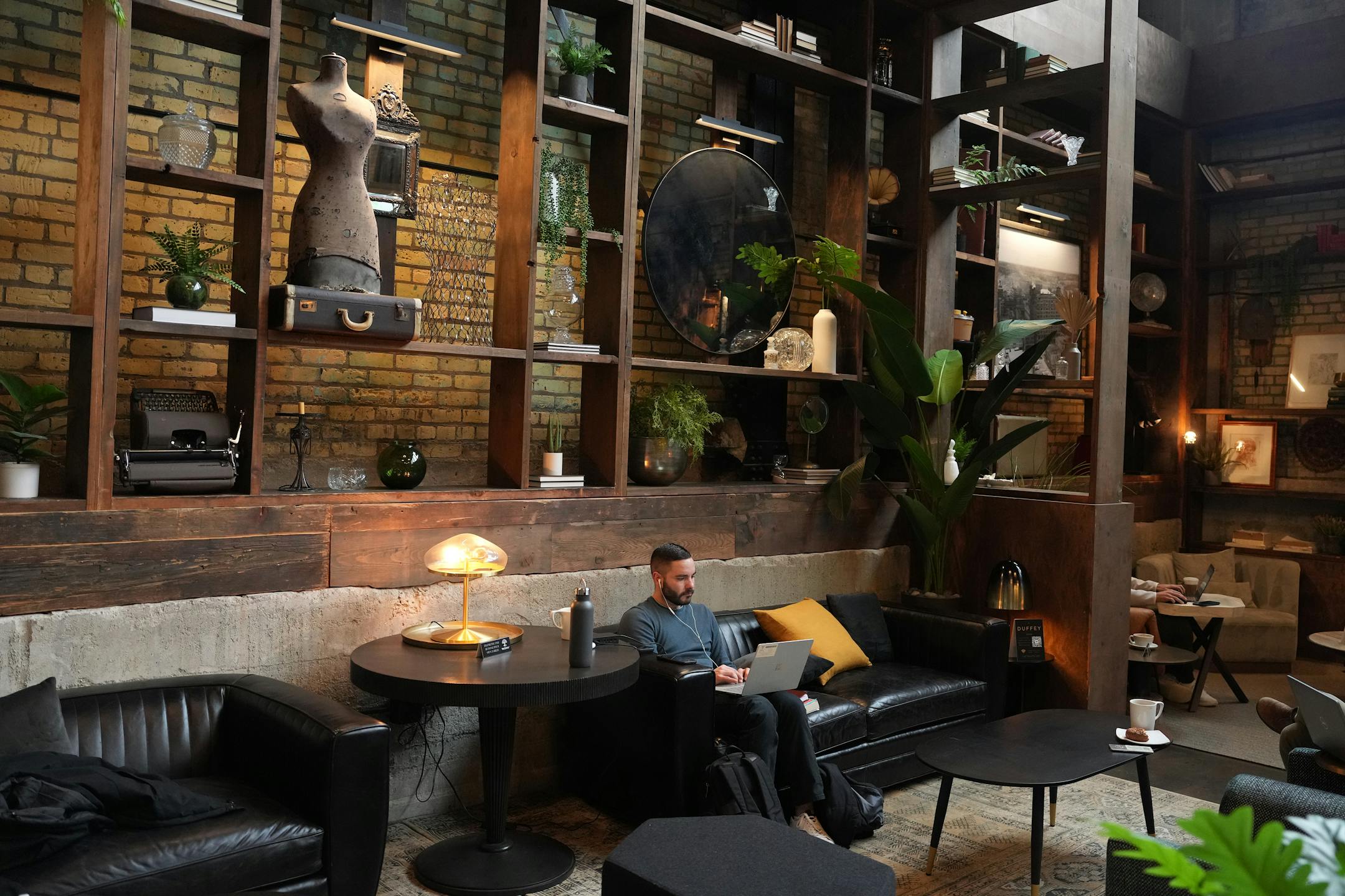 Patrons sat about in the expansive space at Backstory Coffee.