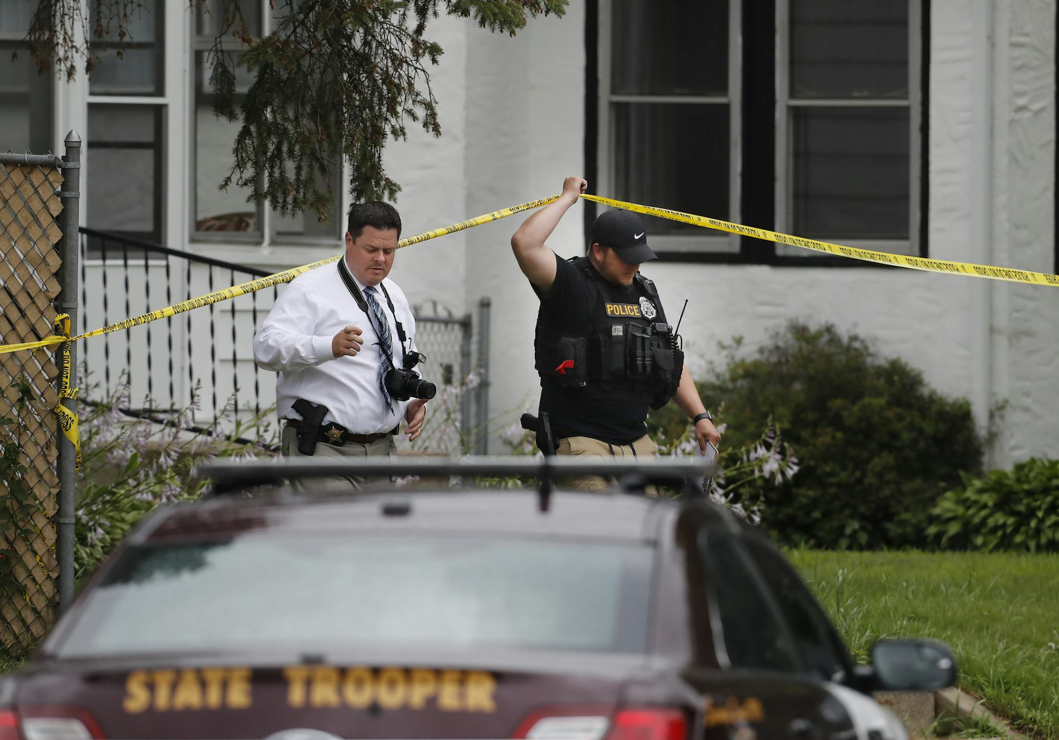 Police invesitigated the scene of a shooting between a suspect and South St. Paul police officer who was injured a little past noon on 7/19/2018] . Richard Tsong-Taatariiïrtsong-taatarii@startribune.com