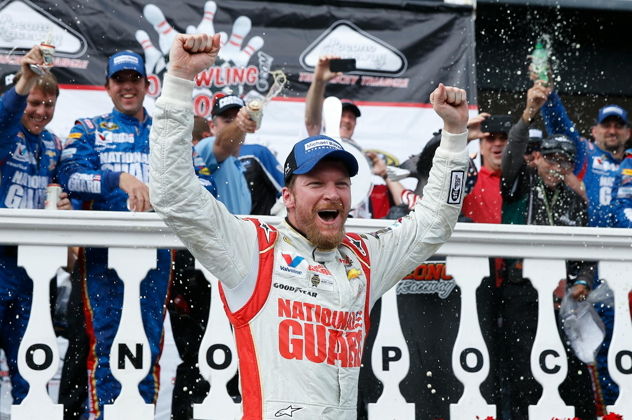 Dale Earnhardt Jr. celebrated in Victory Lane after winning the NASCAR Sprint Cup race at Pocono Raceway on Sunday. Earnhardt sweep the Pocono races this season.