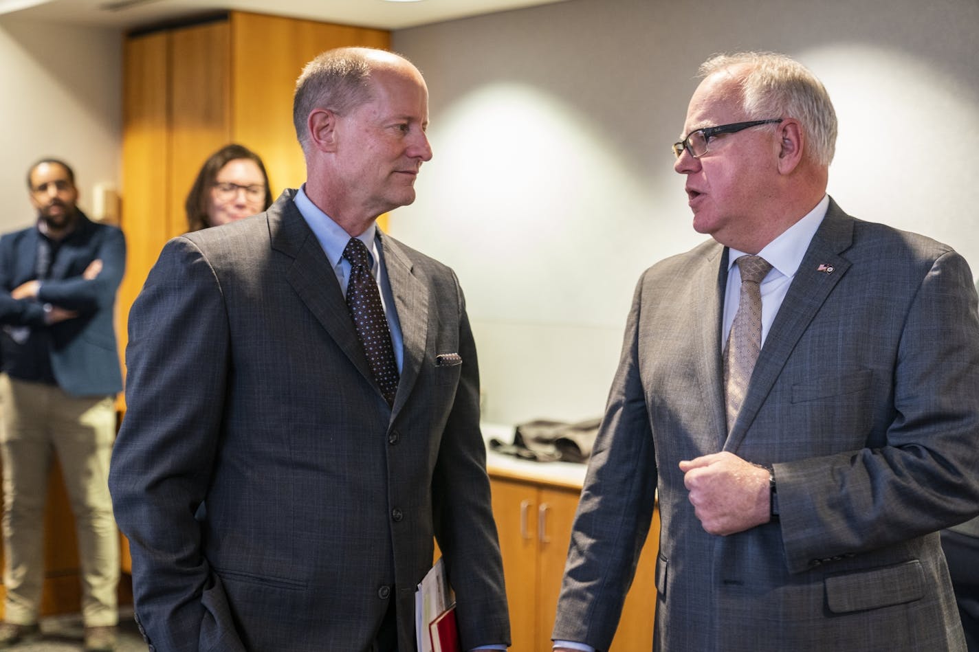 Gov. Tim Walz, right, spoke with Senate Majority Leader Paul Gazelka after the Minnesota state budget and economic forecast on Dec. 5, 2019.