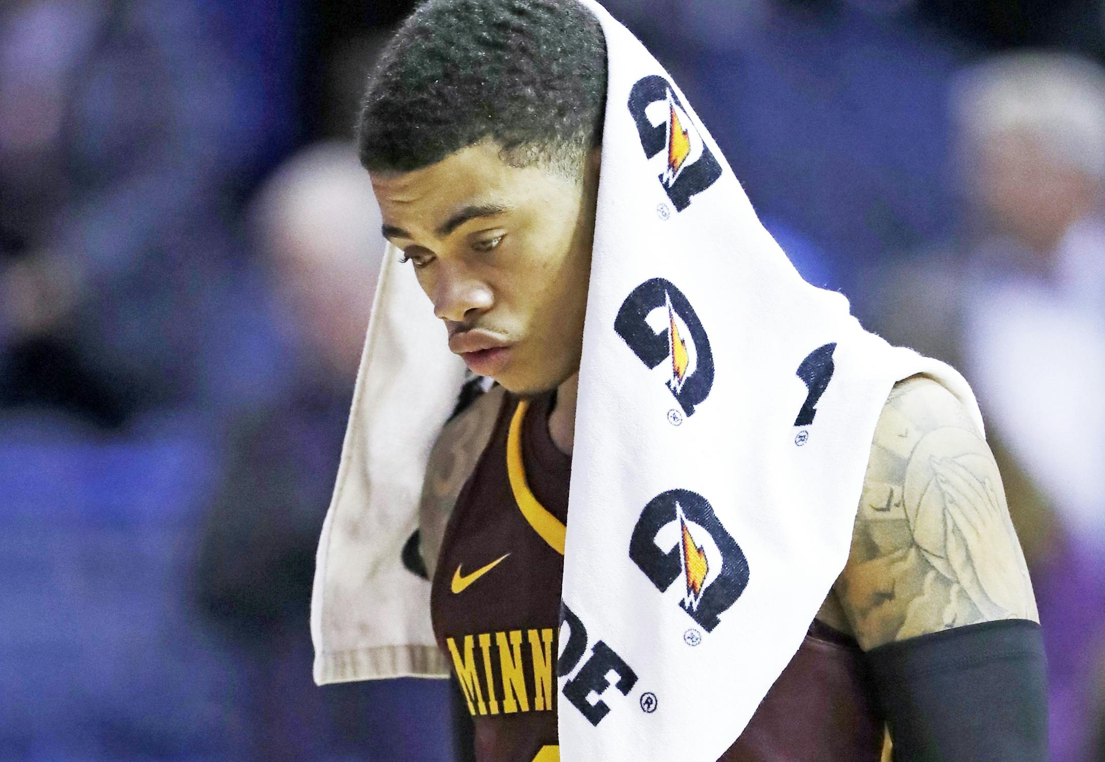 Minnesota guard Nate Mason walks off the court after the team's 83-60 loss to Northwestern in an NCAA college basketball game Wednesday, Jan. 10, 2018, in Rosemont, Ill. (AP Photo/Nam Y. Huh) ORG XMIT: MIN2018011022540064