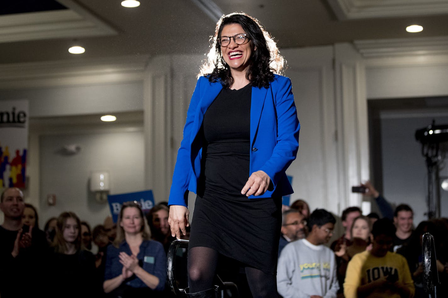 Rep. Rashida Tlaib, D-Mich., arrives to speak before Democratic presidential candidate Sen. Bernie Sanders, I-Vt., arrives at a climate rally with the Sunrise Movement at The Graduate Hotel, Sunday, Jan. 12, 2020, in Iowa City, Iowa. (AP Photo/Andrew Harnik)