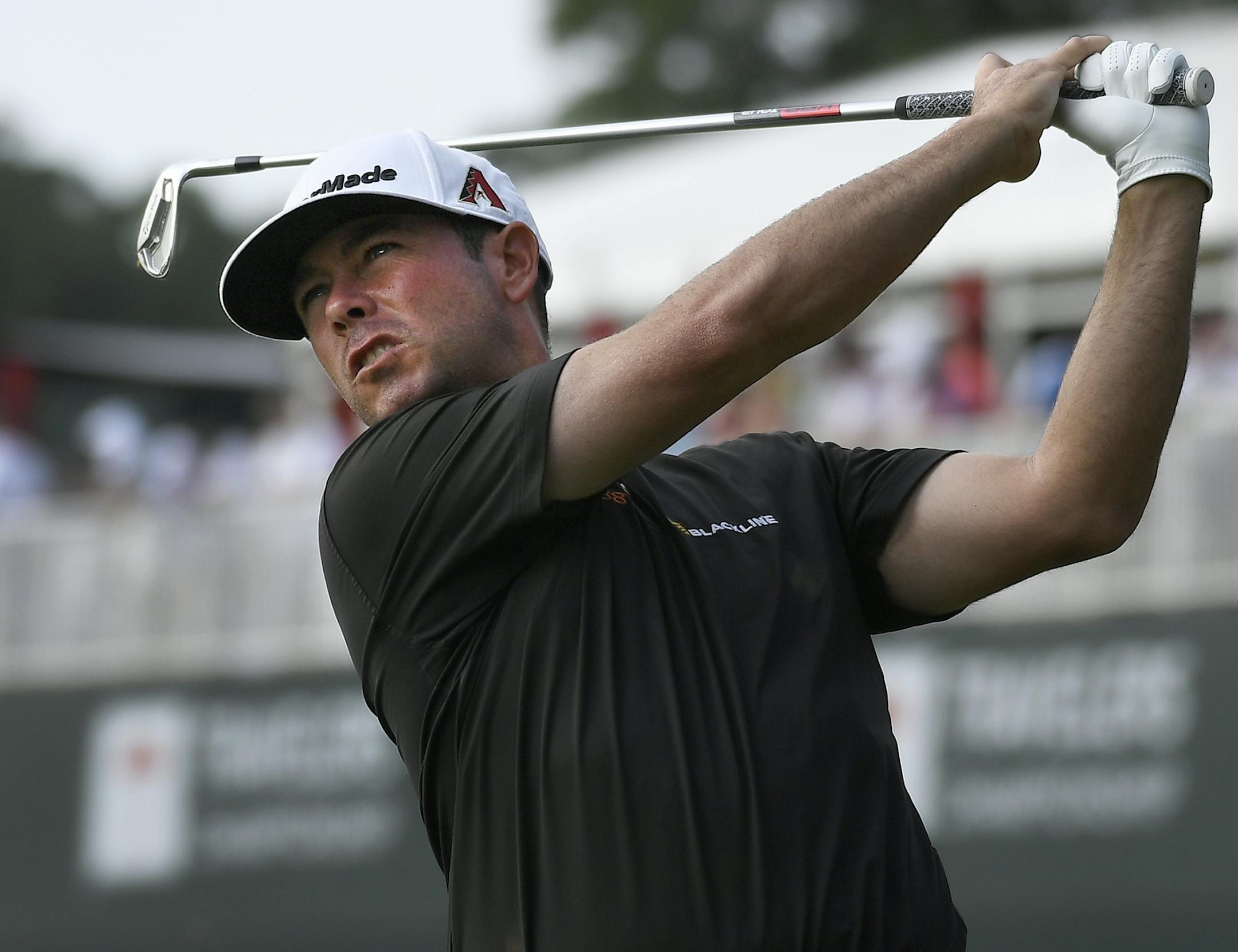 Chez Reavie hits off the 16th tee during the third round of the Travelers Championship golf tournament Saturday, June 22, 2019, in Cromwell, Conn. (AP Photo/Jessica Hill)