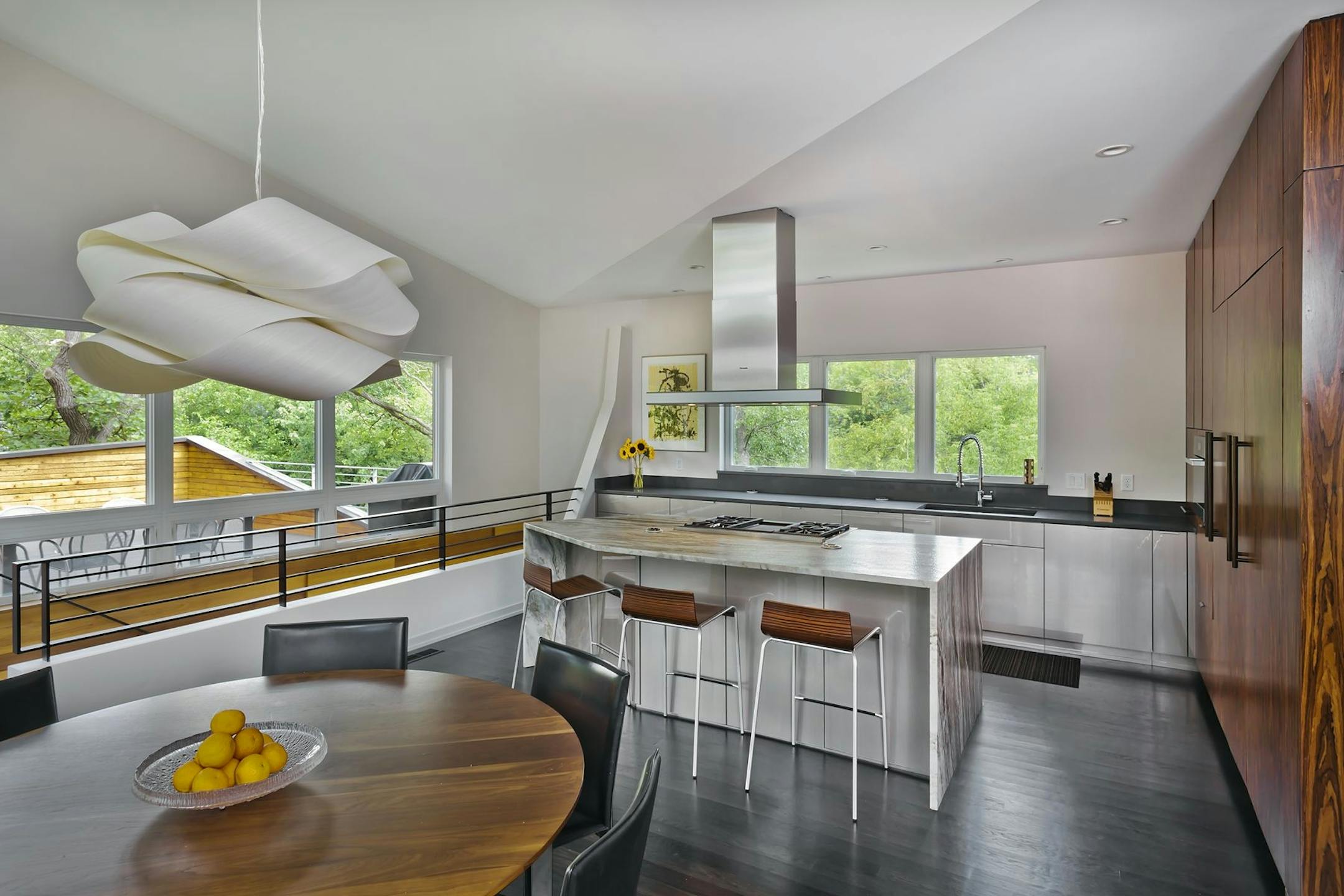 Home of the Month: RoehrSchmitt Architecture translated the best features of a family's downtown loft into a new modern home . Credit Gilbertson Photography