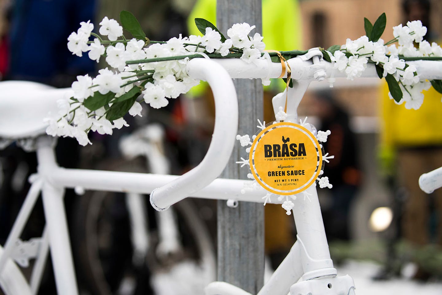 A Brasa ornament hangs on the ghost bike memorial for Jose Hernandez Solano.