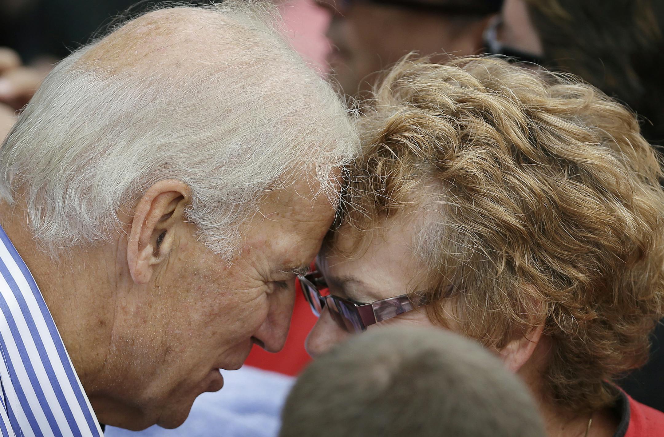 Vice President Joe Biden talks with a supporter after speaking at Iowa Sen. Tom Harkin's annual fundraising steak fry dinner, Sunday, Sept. 15, 2013, in Indianola, Iowa. (AP Photo/Charlie Neibergall)