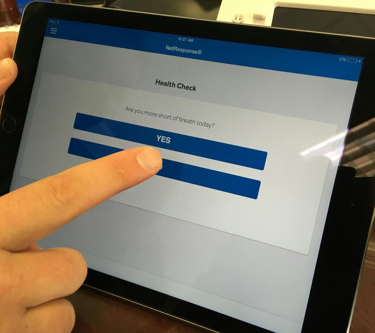 One of the kinds of questions a patient would answer on the device that might prompt them to take a reading like a blood pressure reading.