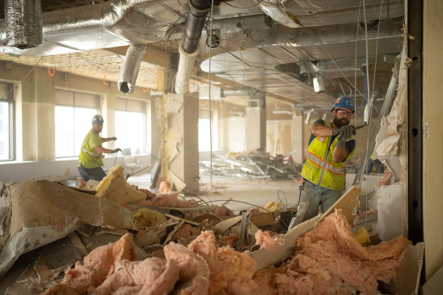 Demolition is underway on the 11th floor in the Northstar Center East project where work has begun to convert the 13 story office building into 216 apartments. Minneapolis-based developer Sherman Associates is turning the 13-story Northstar Center East into 216 mixed-income apartments.