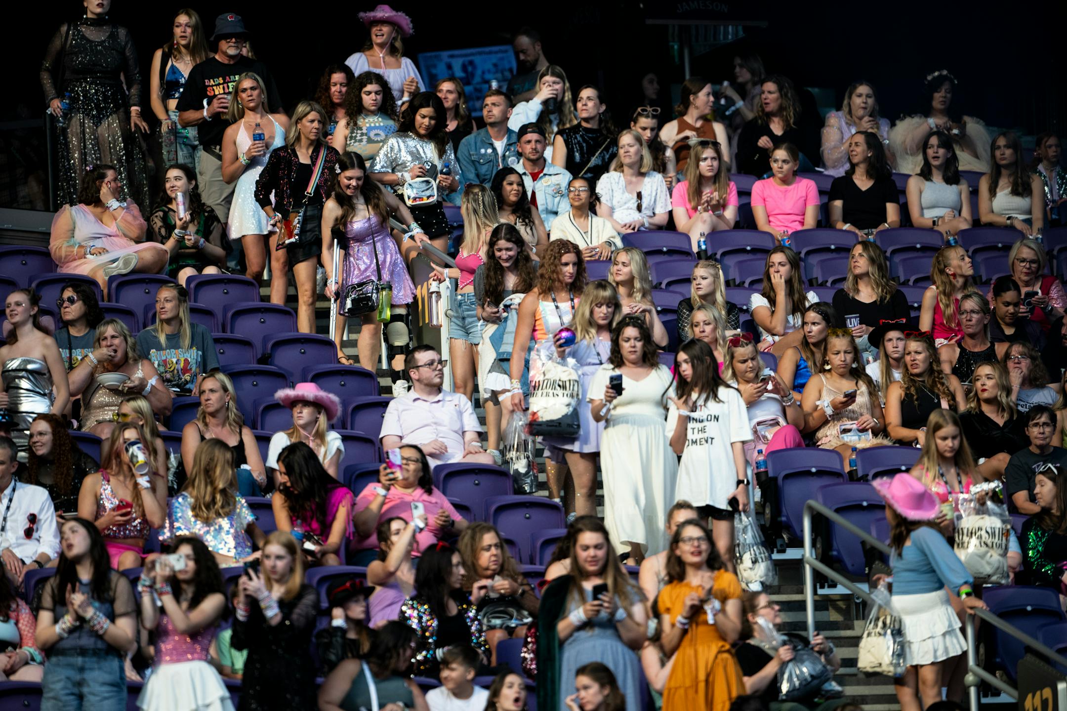 Taylor Swift fans steam into the stands before a concert Friday, June 23, 2023, at US Bank Stadium in Minneapolis, Minn.